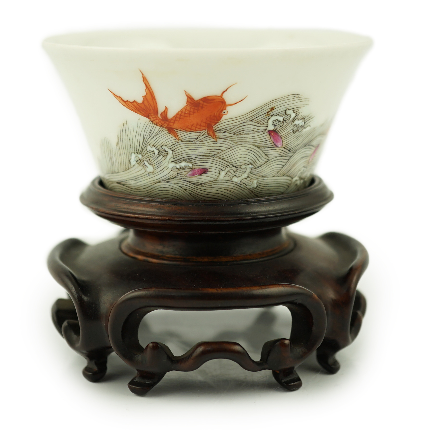 A Chinese enamelled porcelain 'leaping carp' cup, Daoguang mark and possibly of the period